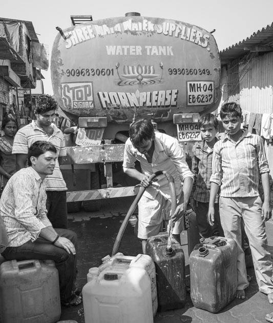 In urban slums of Mumbai that lack municipal water supply, water provision by a private tanker as a booming permanent business